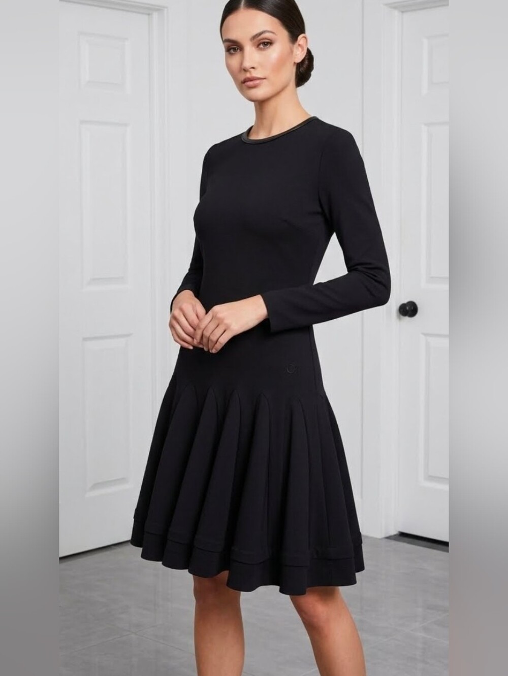 Givenchy dress featuring a contemporary design, a ruffled skirt, and a subtle pr
